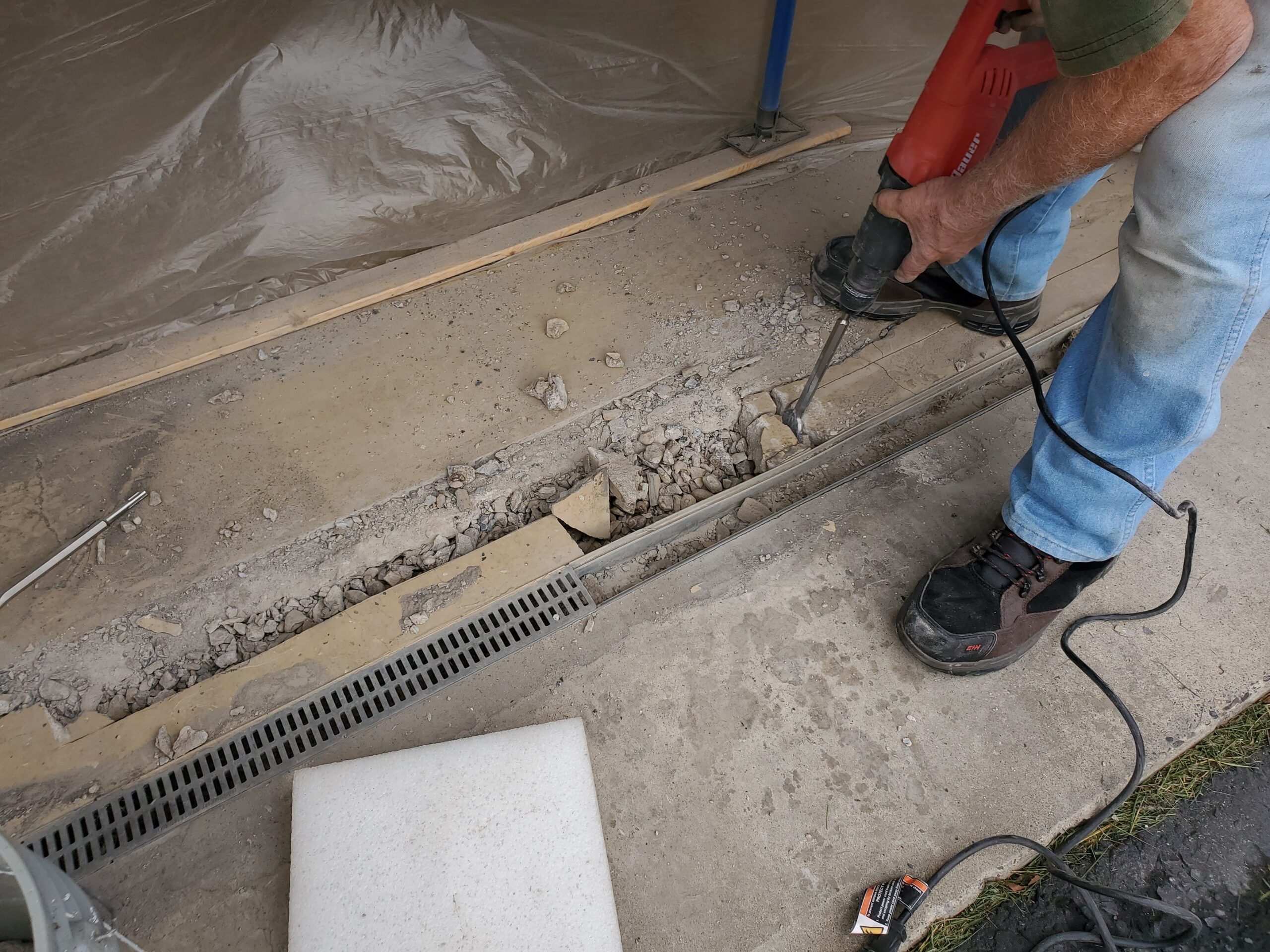 PA HomeBase worker doing concrete work